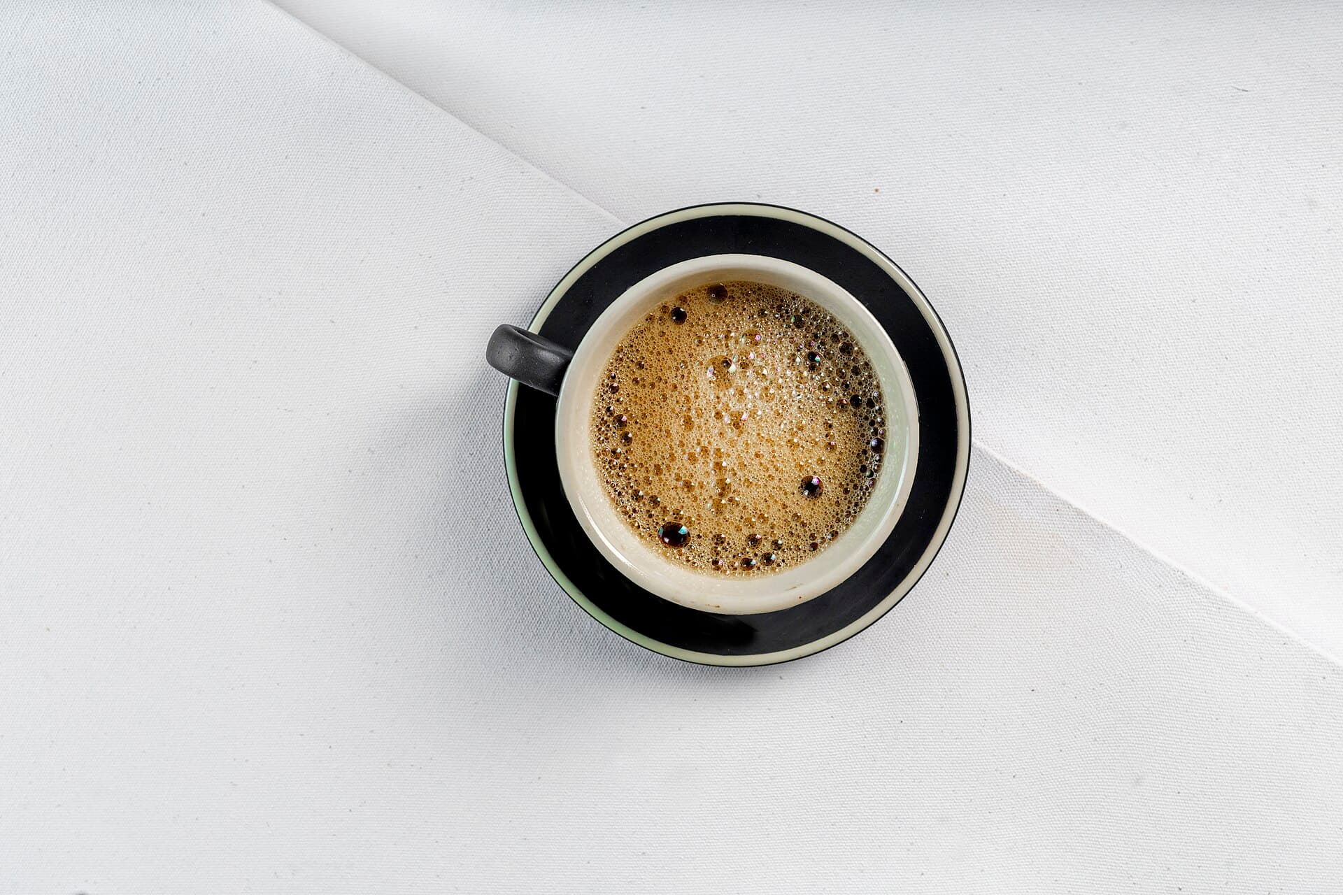 A freshly pulled espresso in a cup.